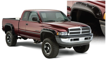 Bushwacker 50908-02 - Black Pocket/Rivet Style Smooth Finish 4-Piece Fender Flare Set For 1994-2001 Dodge Ram 1500 1994-2002 Ram 2500, 3500 (Excludes
