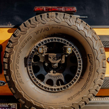 KC HiLiTES 7478 - Spr Tir Carr (M14x1.5 Lug) - 18+ Jeep Wrangler JL /21+ Ford Bronco Raptor 2
