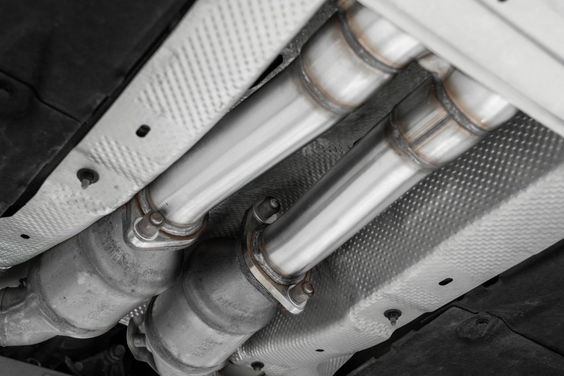 MBRP S4708304 2.5 Inch Cat-Back Dual Split Rear Quad Outlet T304 Stainless Steel Active Exhaust